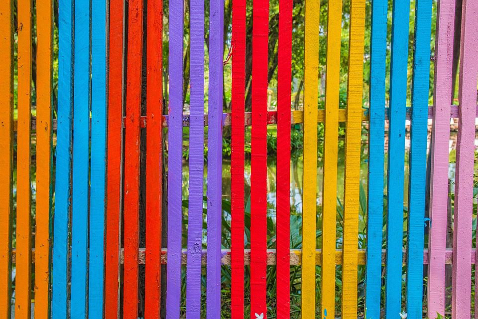 Colorfully painted fence