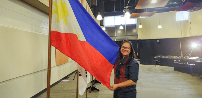 Omega Dancel with Philippines flag