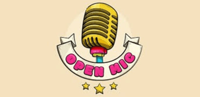 microphone with a banner in front of it that says Open Mic.