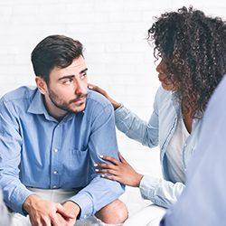Depressed man getting support