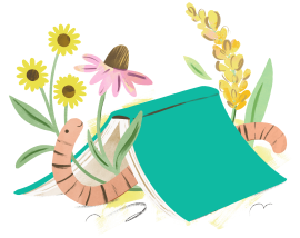 A worm crawling under a book lying in flowers